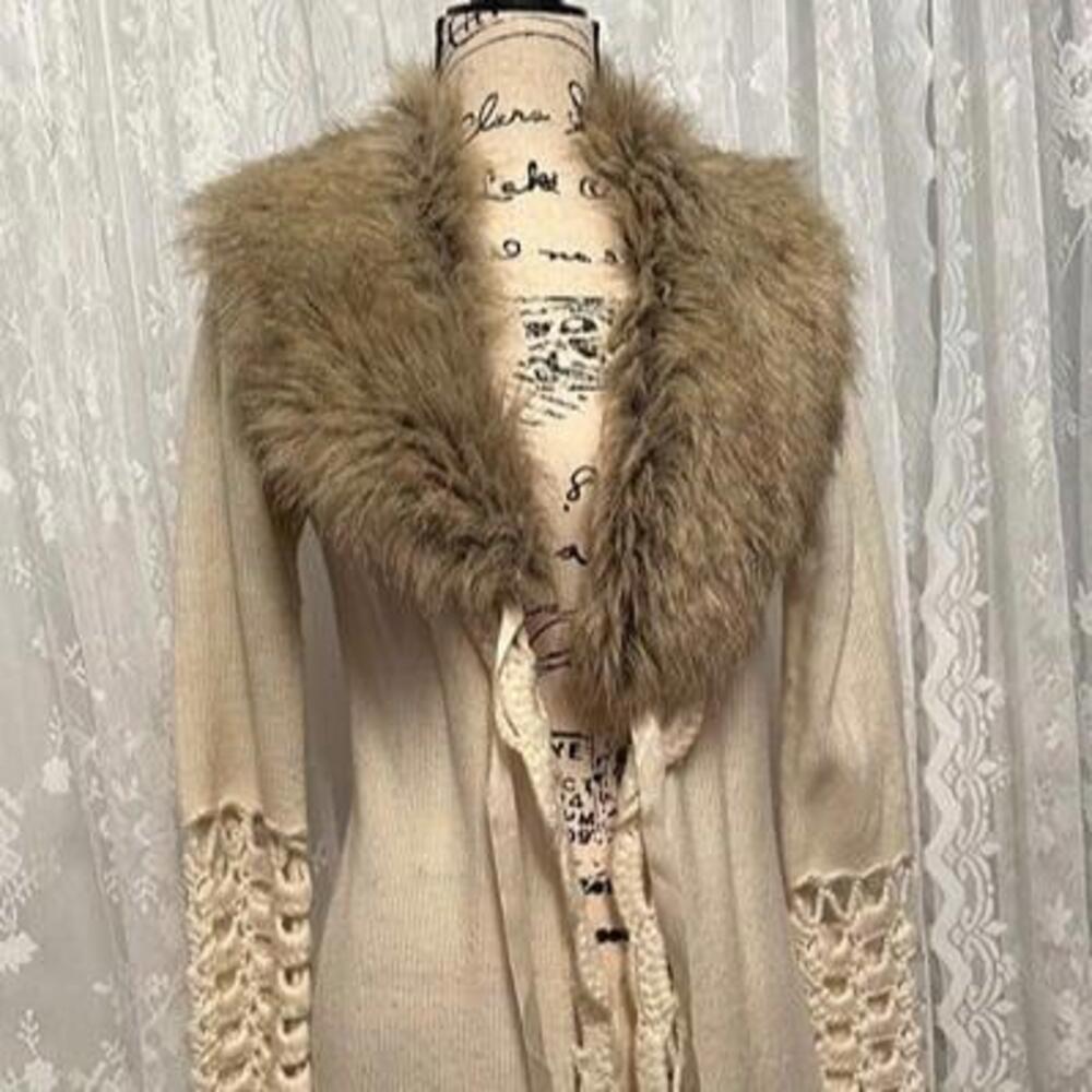 Stay warm and stylish this winter with this faux fur jacket!